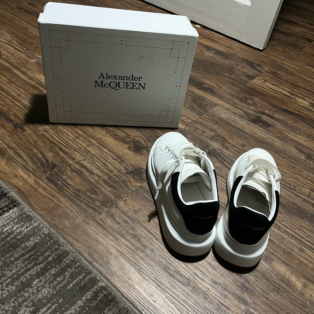 Black and white sued Alexender McQueens